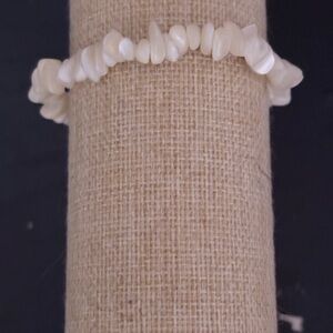 handcrafted bracelet features iridescent white shell chips beaded bracelet